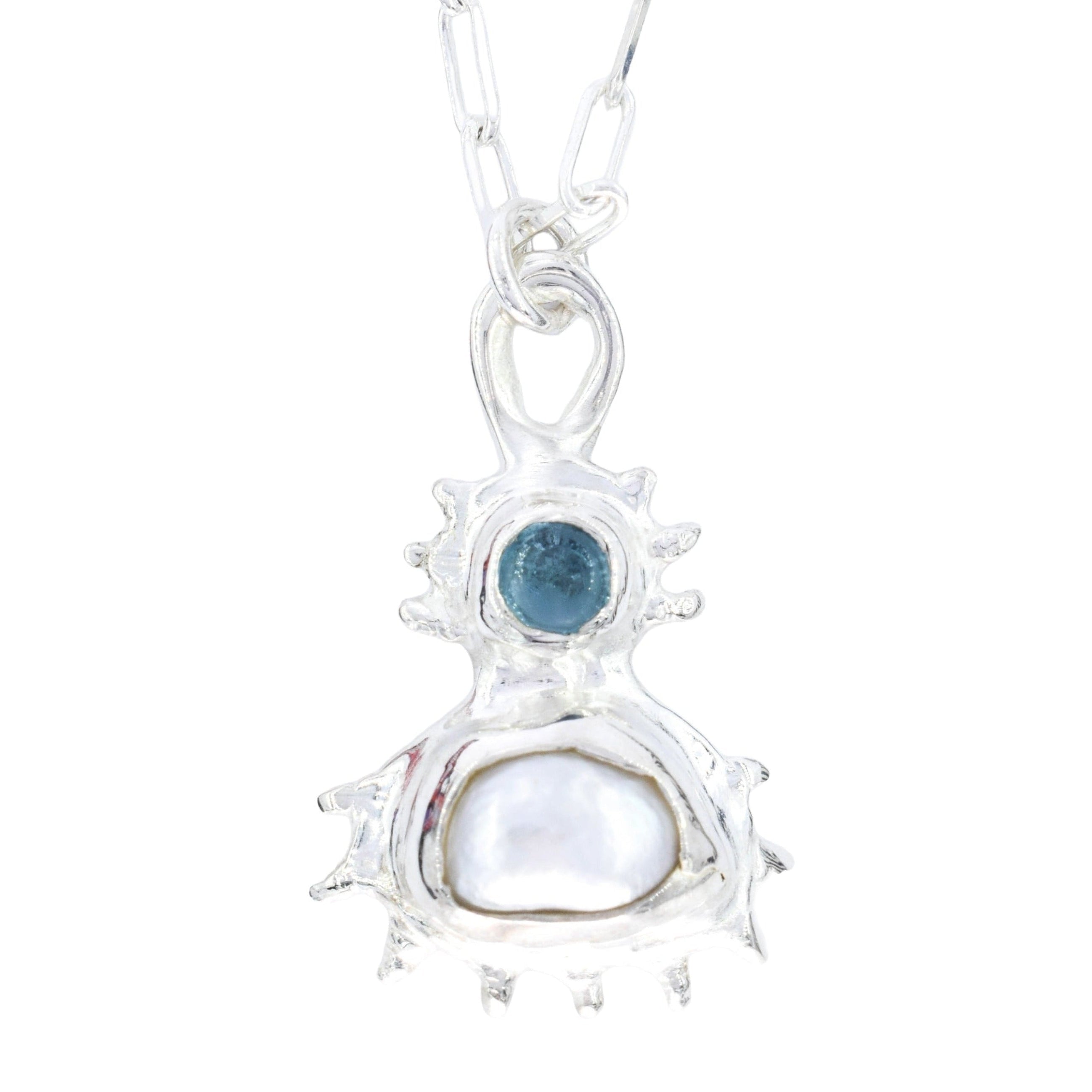 sterling silver pendant with pearl blue topaz and spiked setting