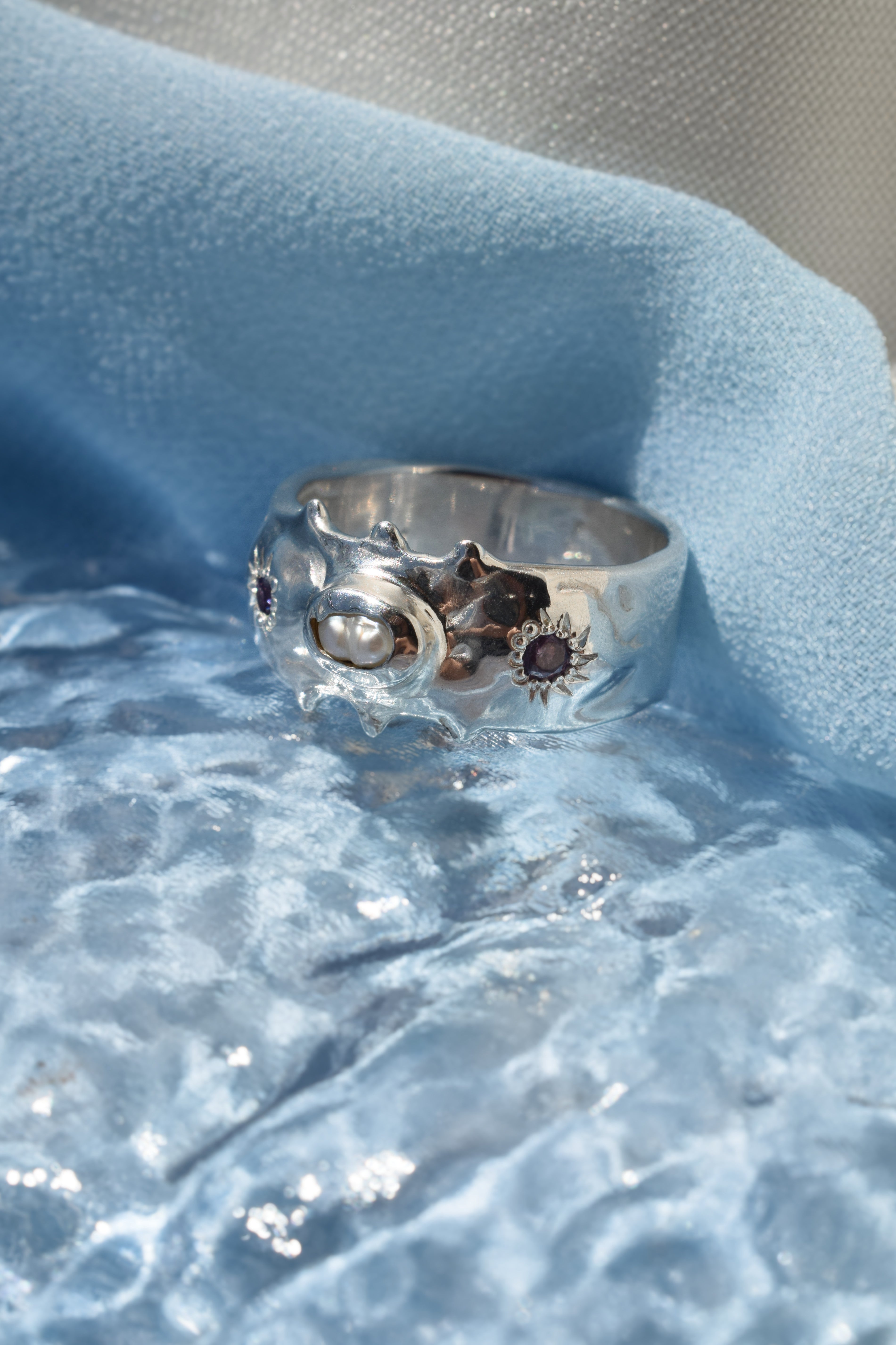 Silver pearl & purple cz crystals wide band ring