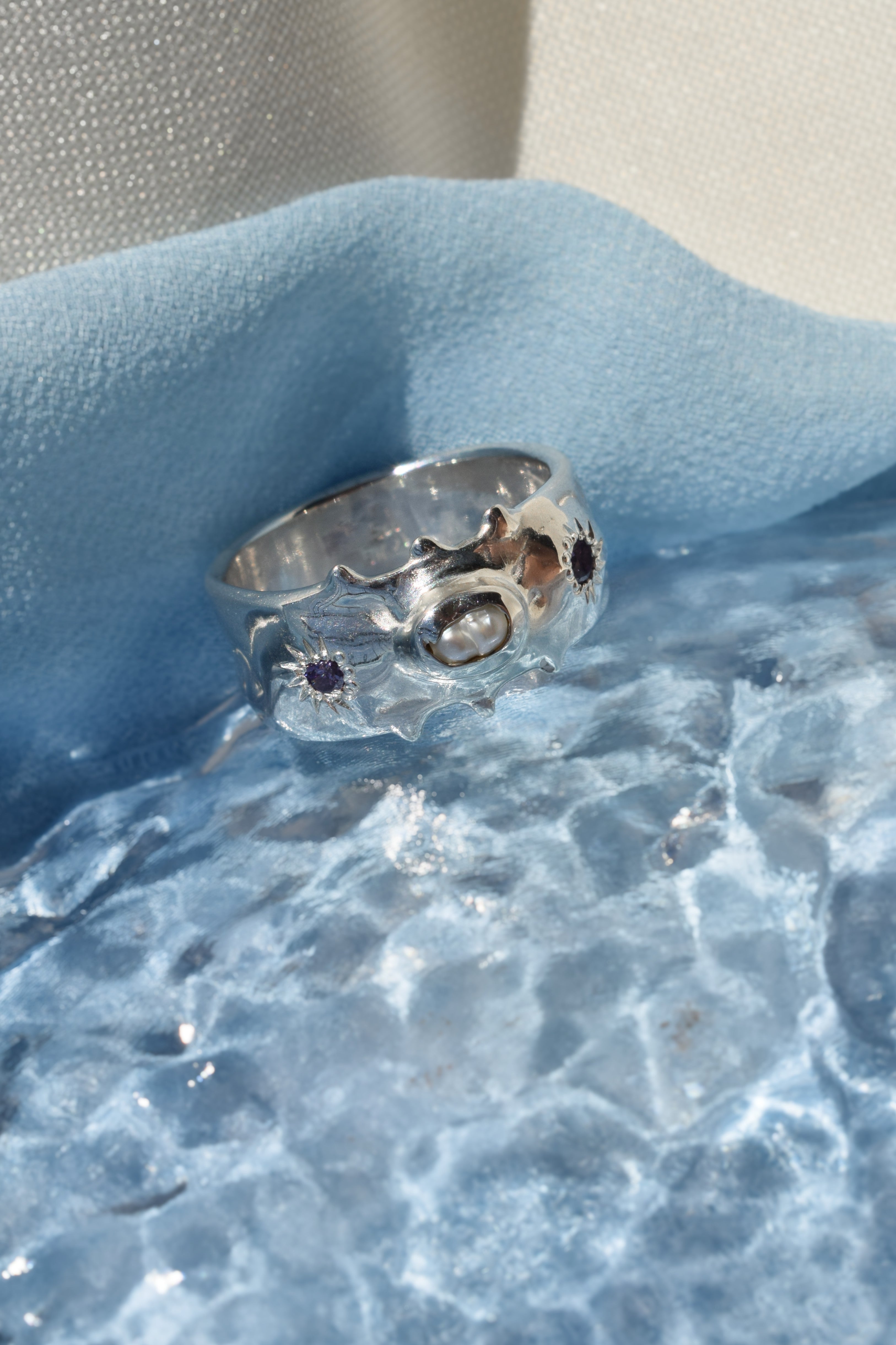 Silver pearl & purple cz crystals wide band ring