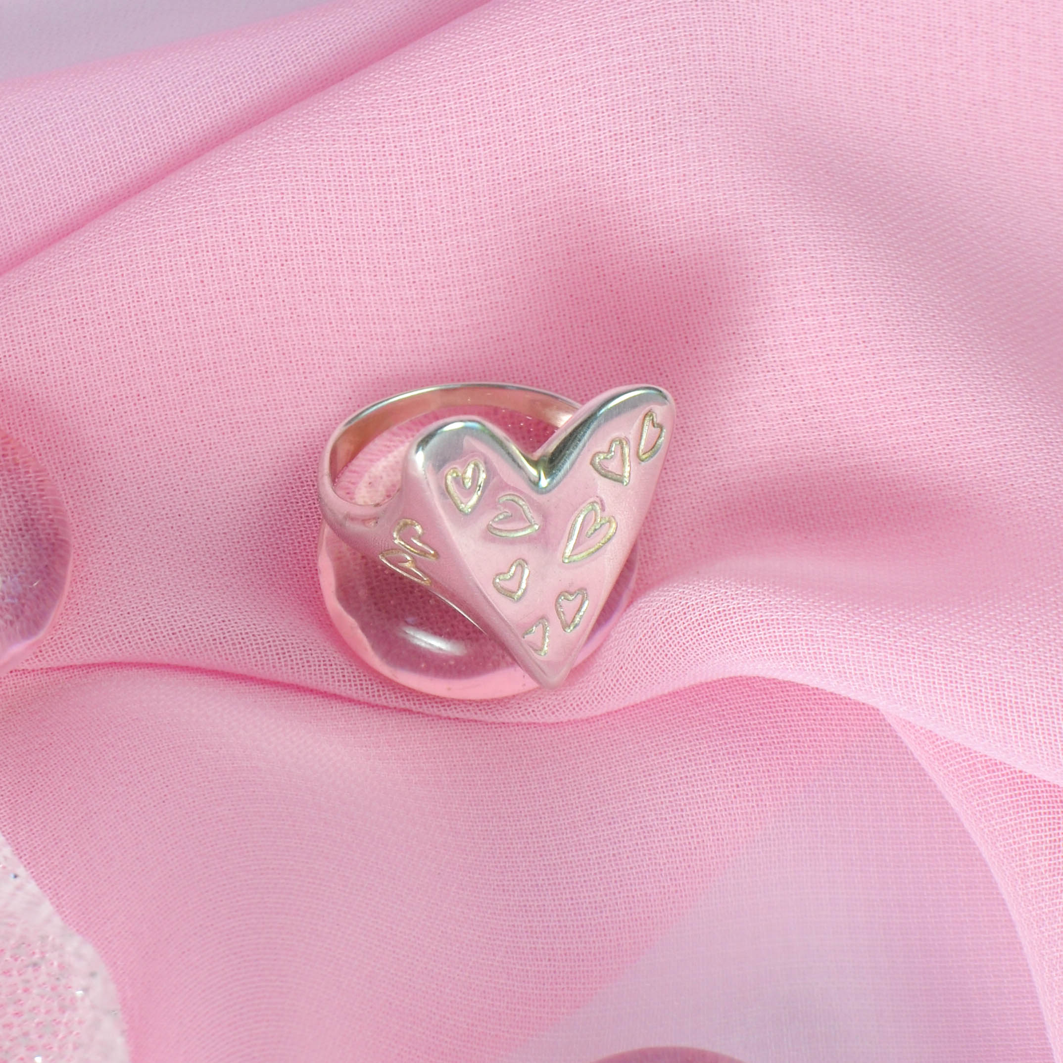 Heart signet ring with many little hearts