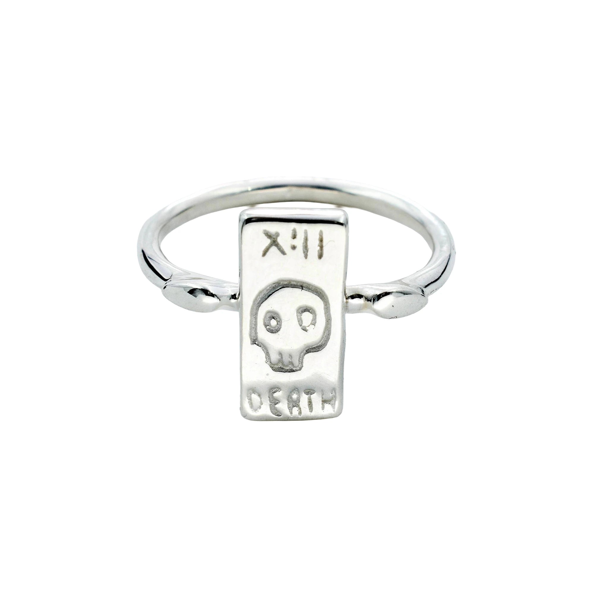 A silver ring featuring a vertical rectangular plaque with a skull design, the Roman numeral XIII, and the word 'DEATH' engraved on it, set against a plain white background.