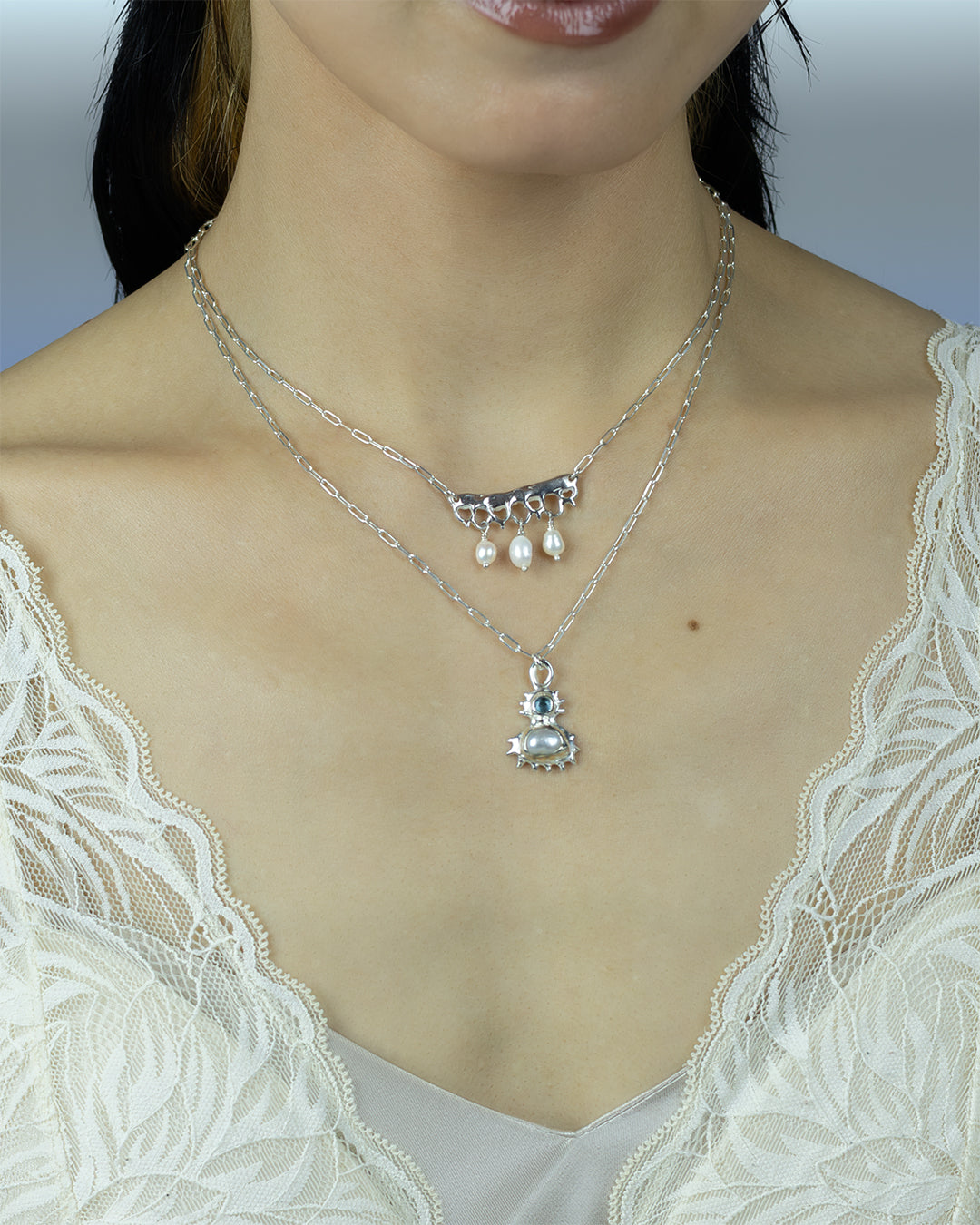 Coral inspired sterling silver pendant with blue topaz & freshwater pearl