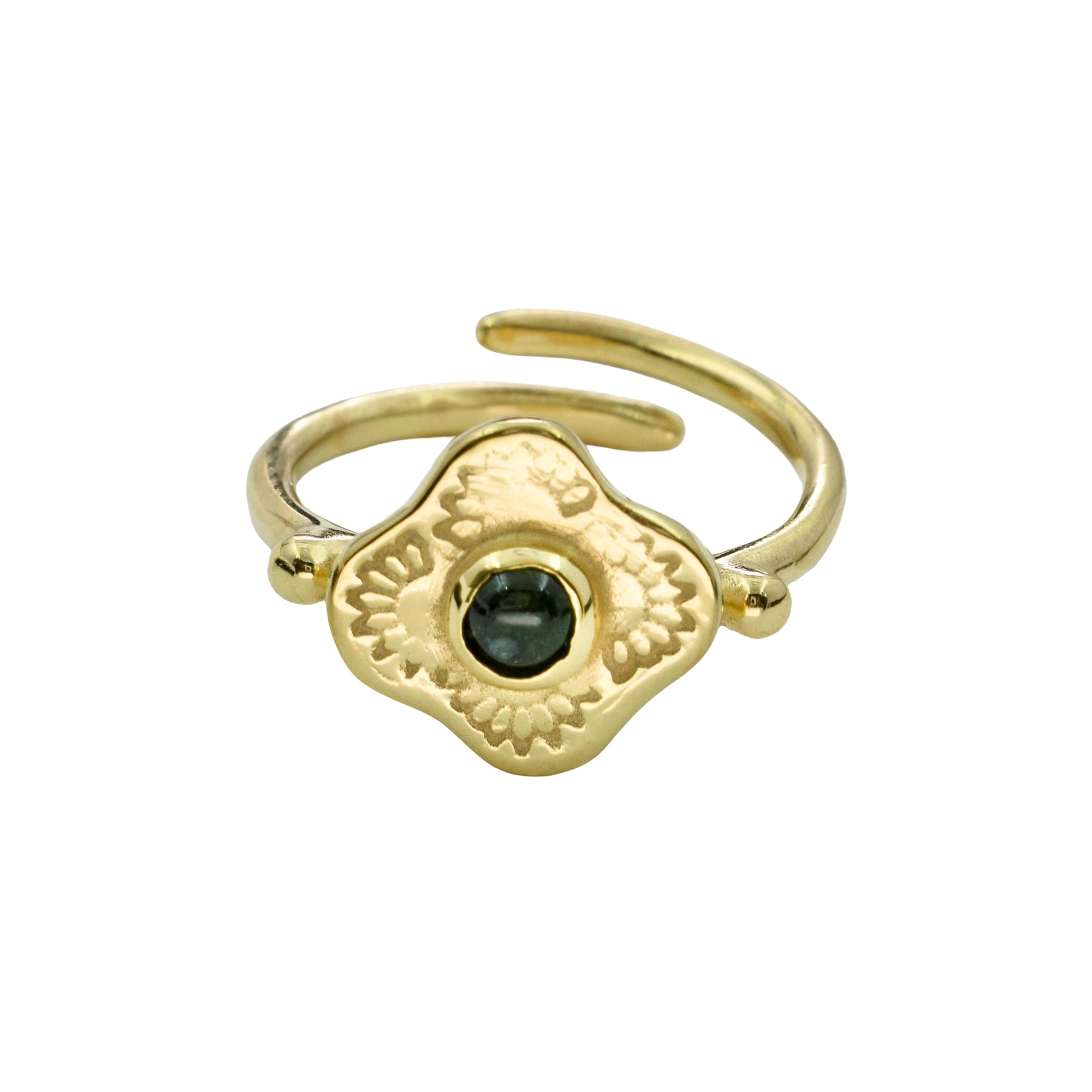 A gold-plated adjustable ring with a textured, flower-like central plate featuring a small dark green gemstone in the center, set against a plain white background.
