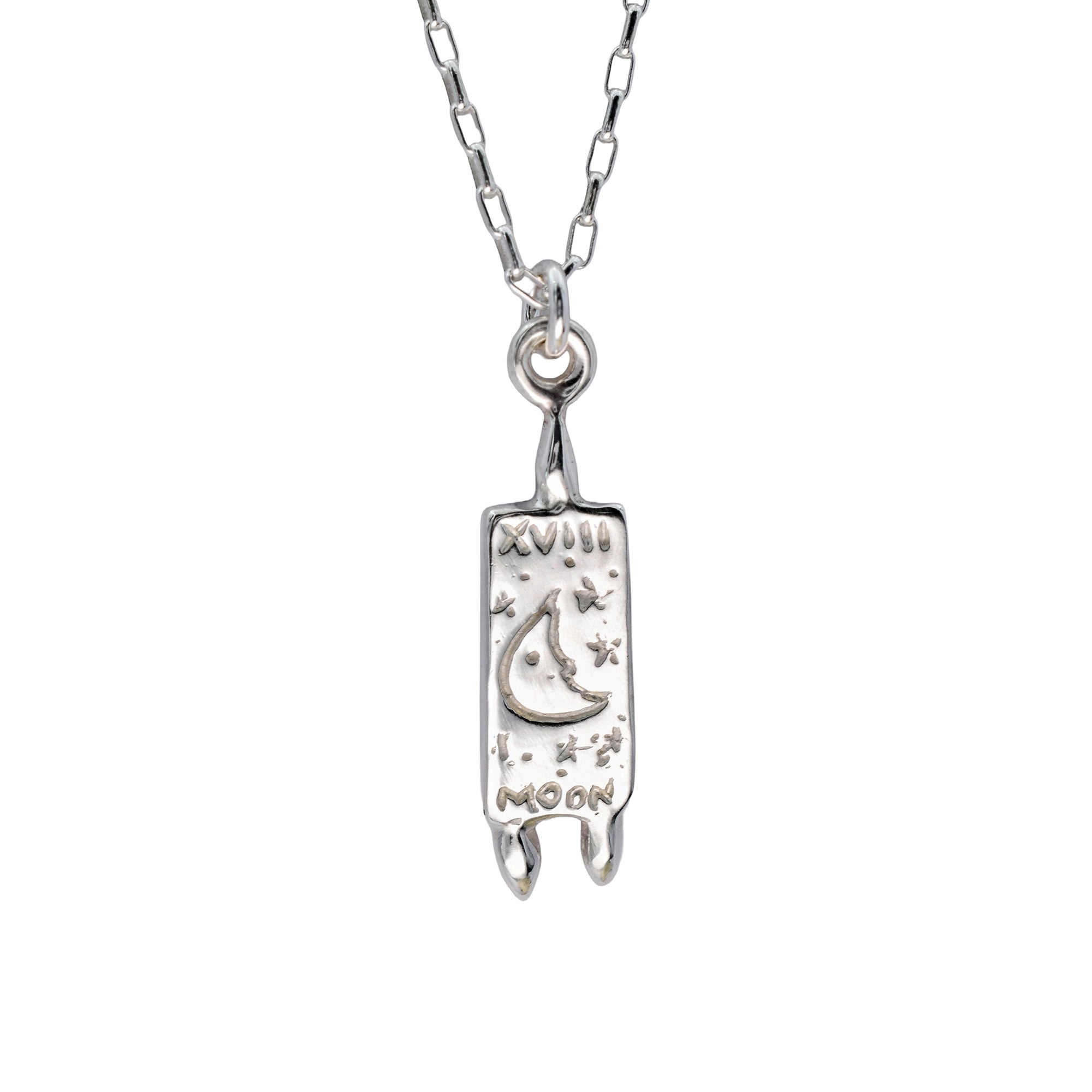 A silver pendant necklace featuring a rectangular mezuzah-style charm with an engraved crescent moon, stars, and Hebrew lettering, suspended from a silver link chain against a plain white background.