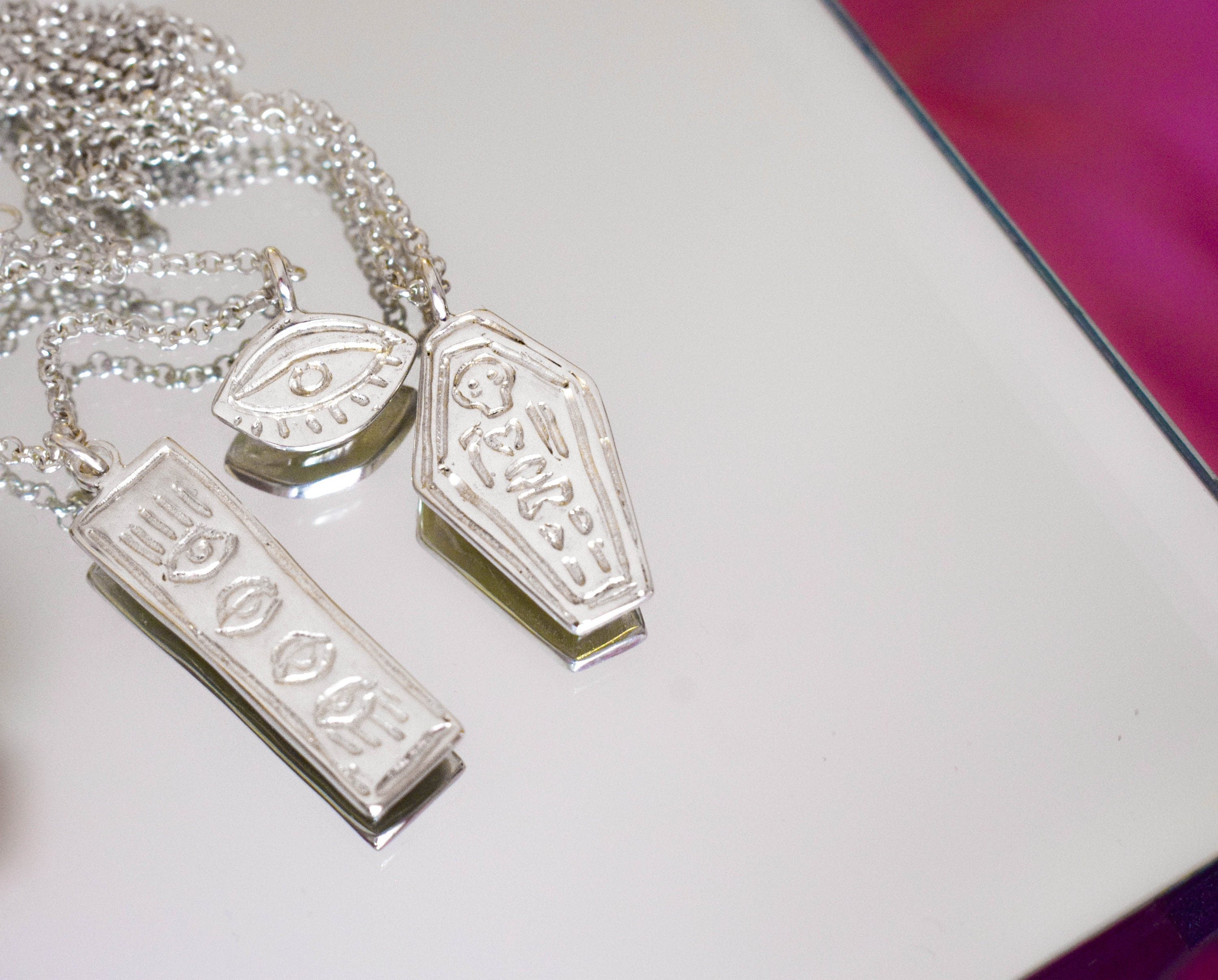 Skeleton in a coffin necklace