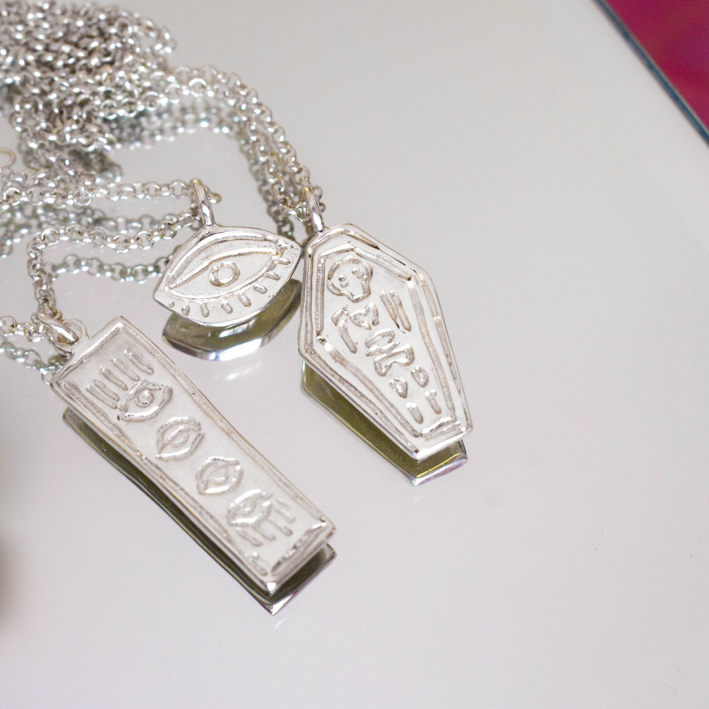 Skeleton in a coffin necklace