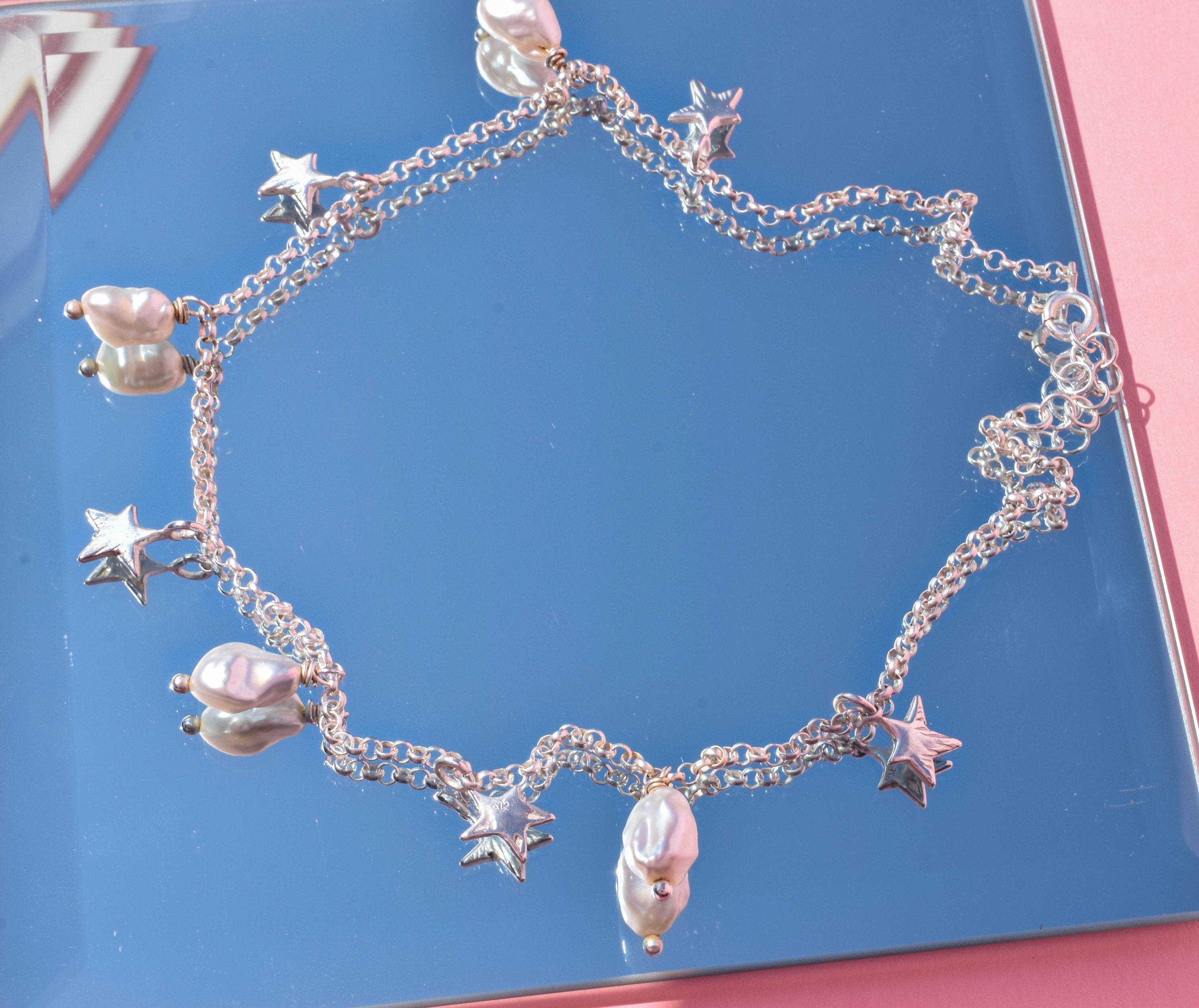Irregular pearl and stars necklace