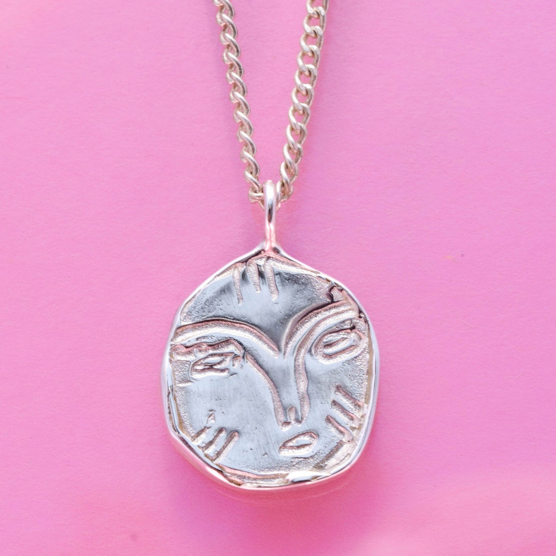 Face necklace