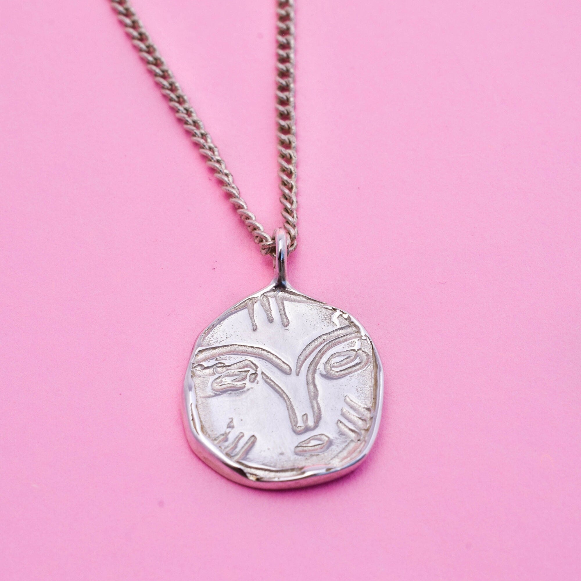 Face necklace