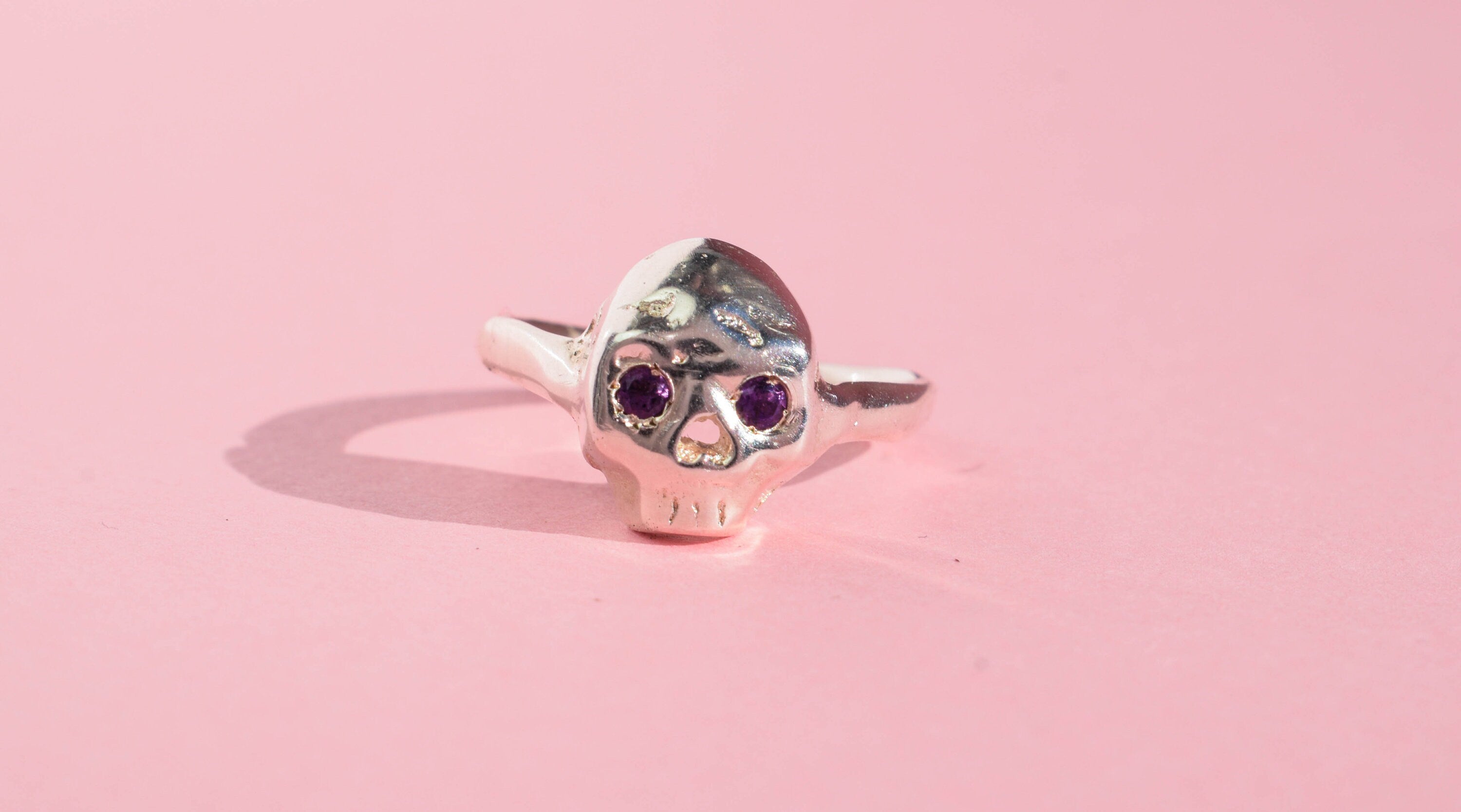 Sterling silver skull ring with amethysts