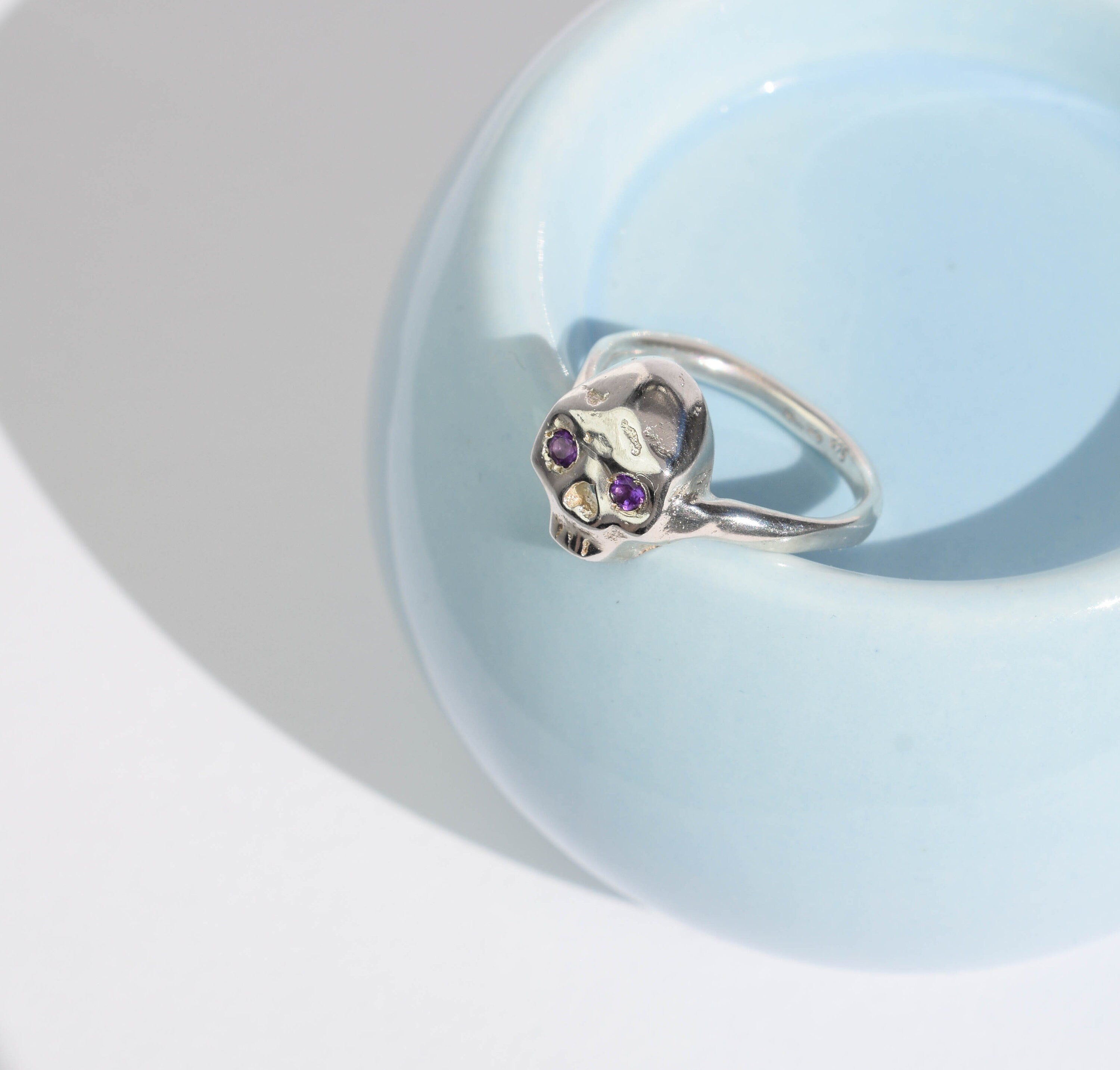 Sterling silver skull ring with amethysts