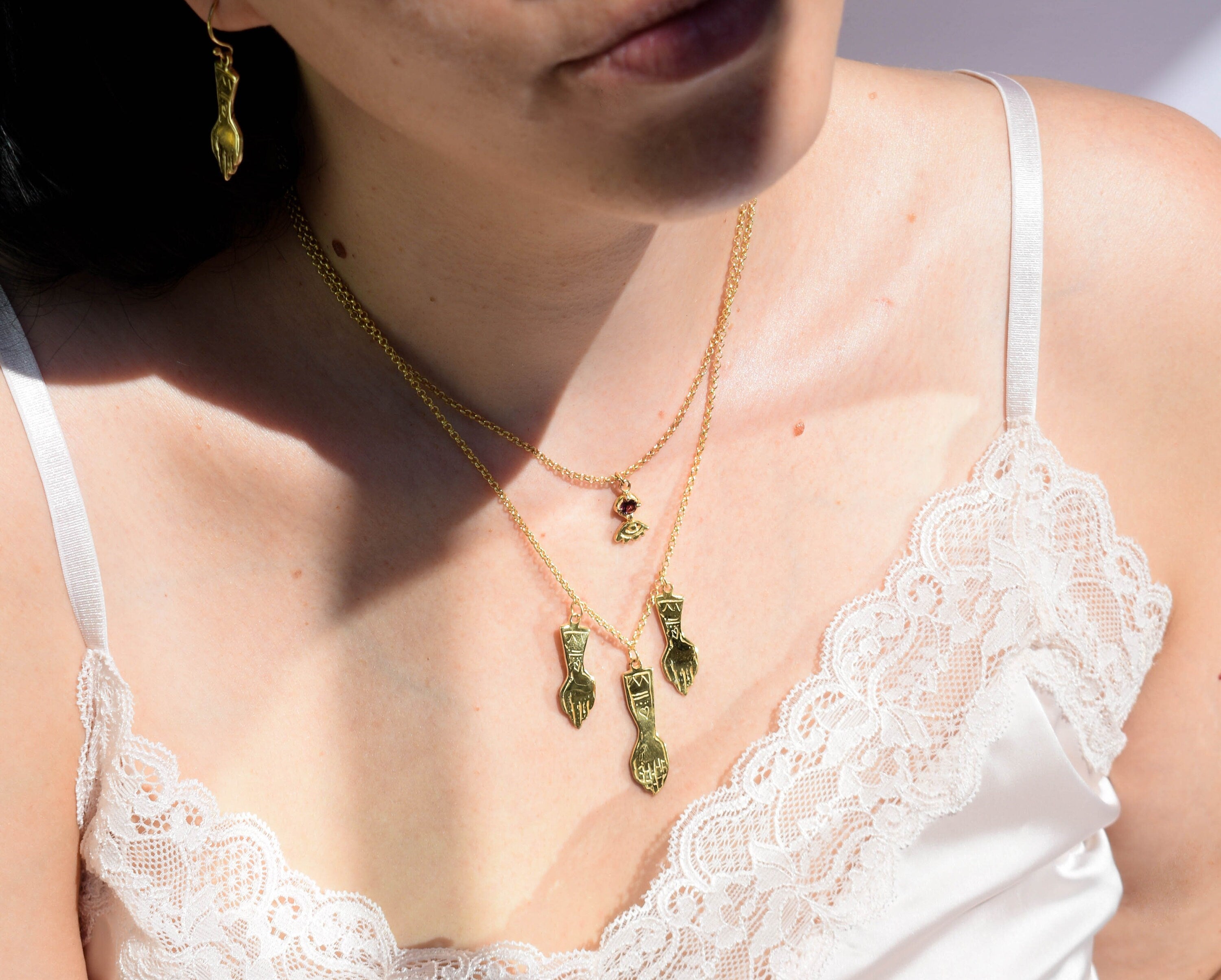 Hands witch necklace