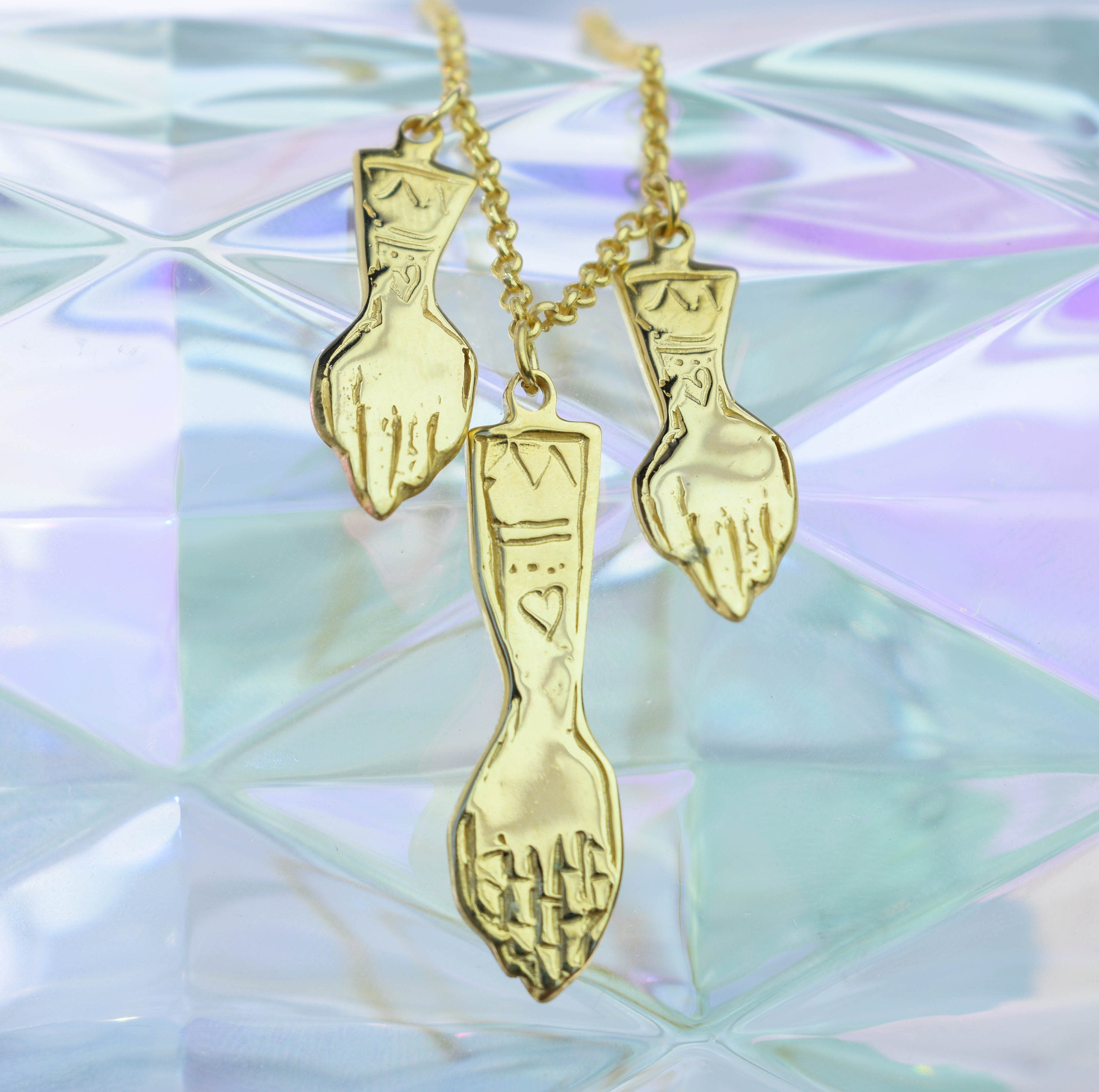 Hands witch necklace