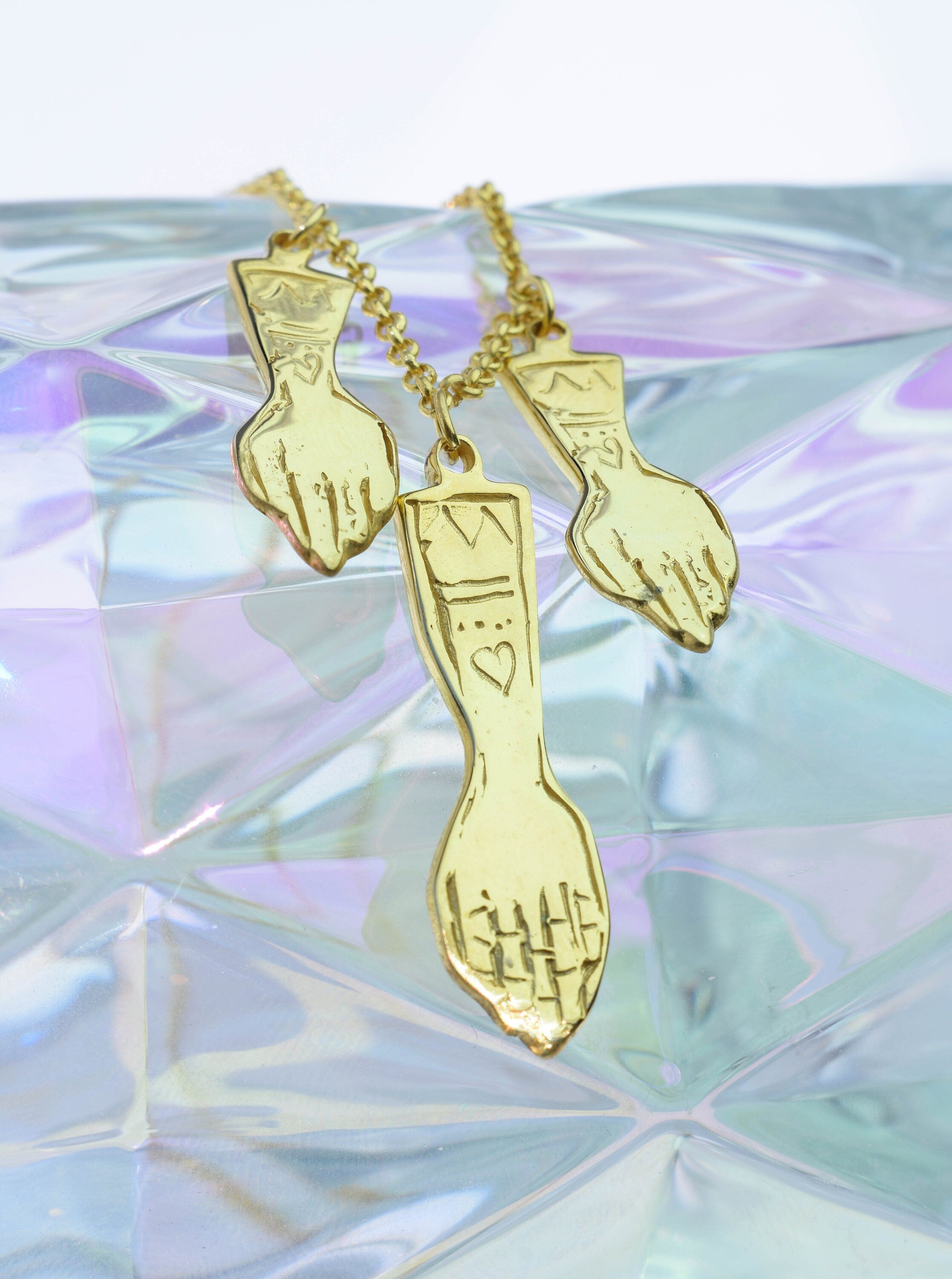 Hands witch necklace