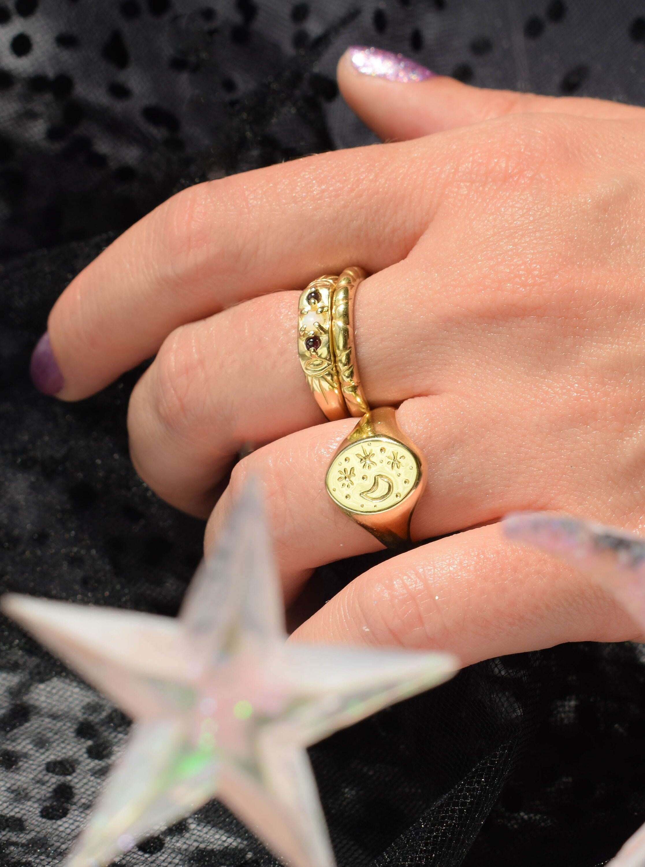Opal and garnet thin band ring with evil eyes