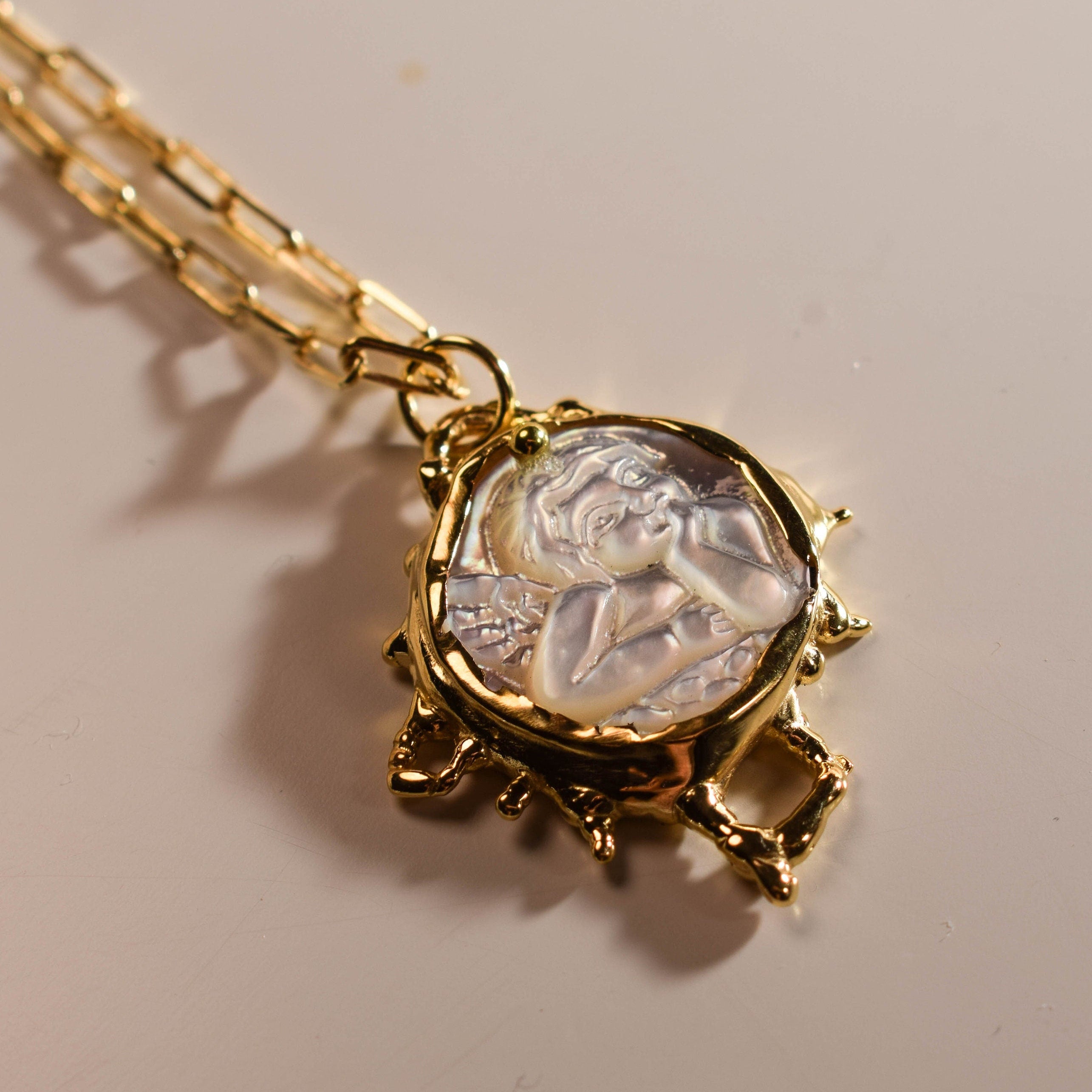 Mother of pearl cupid cameo necklace