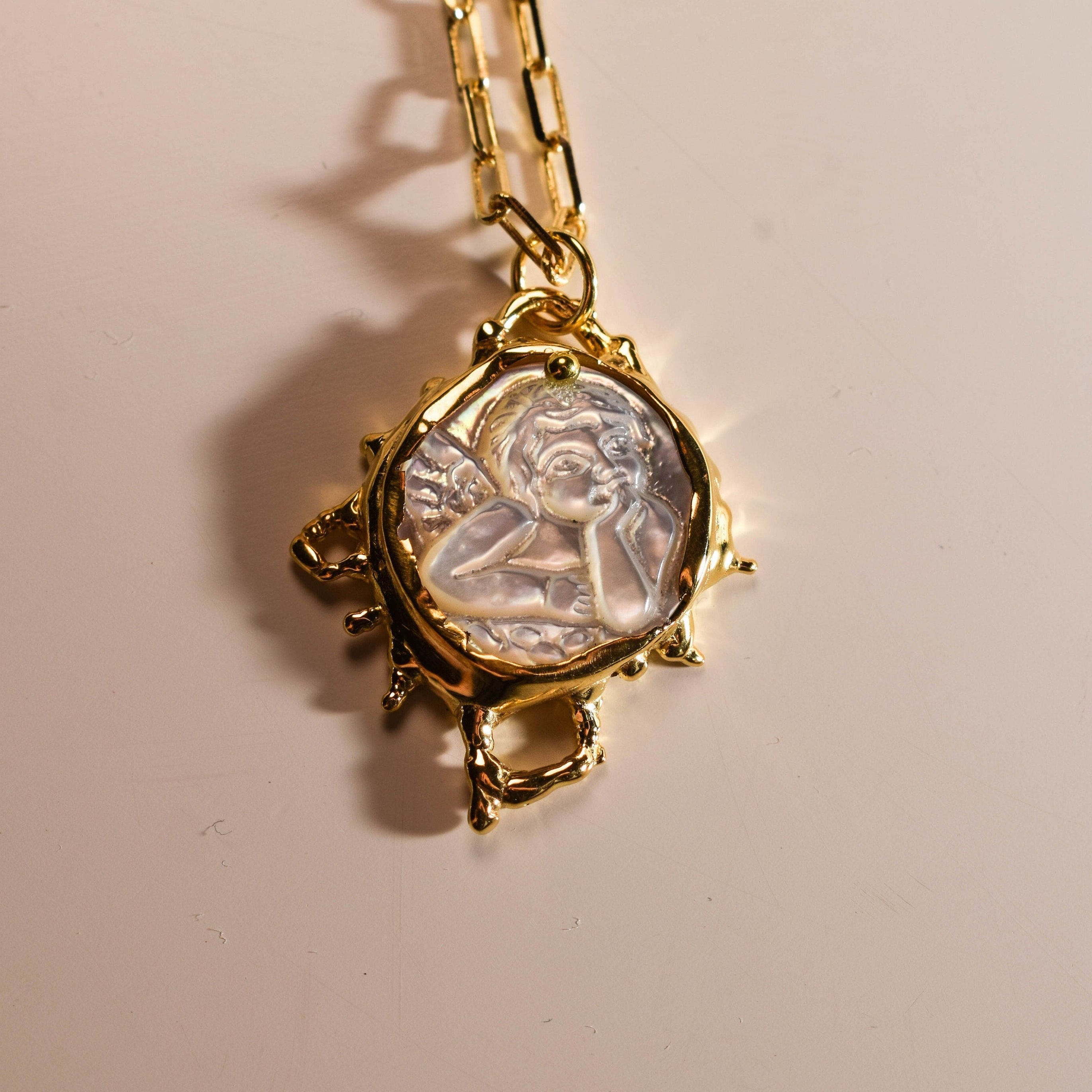Mother of pearl cupid cameo necklace