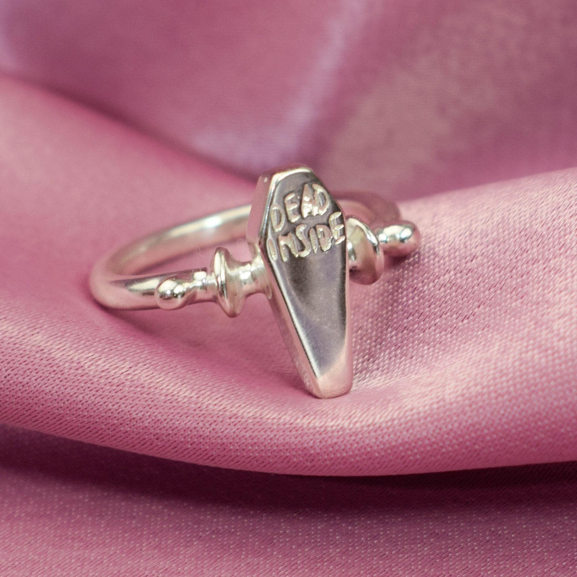 Dead inside coffin ring