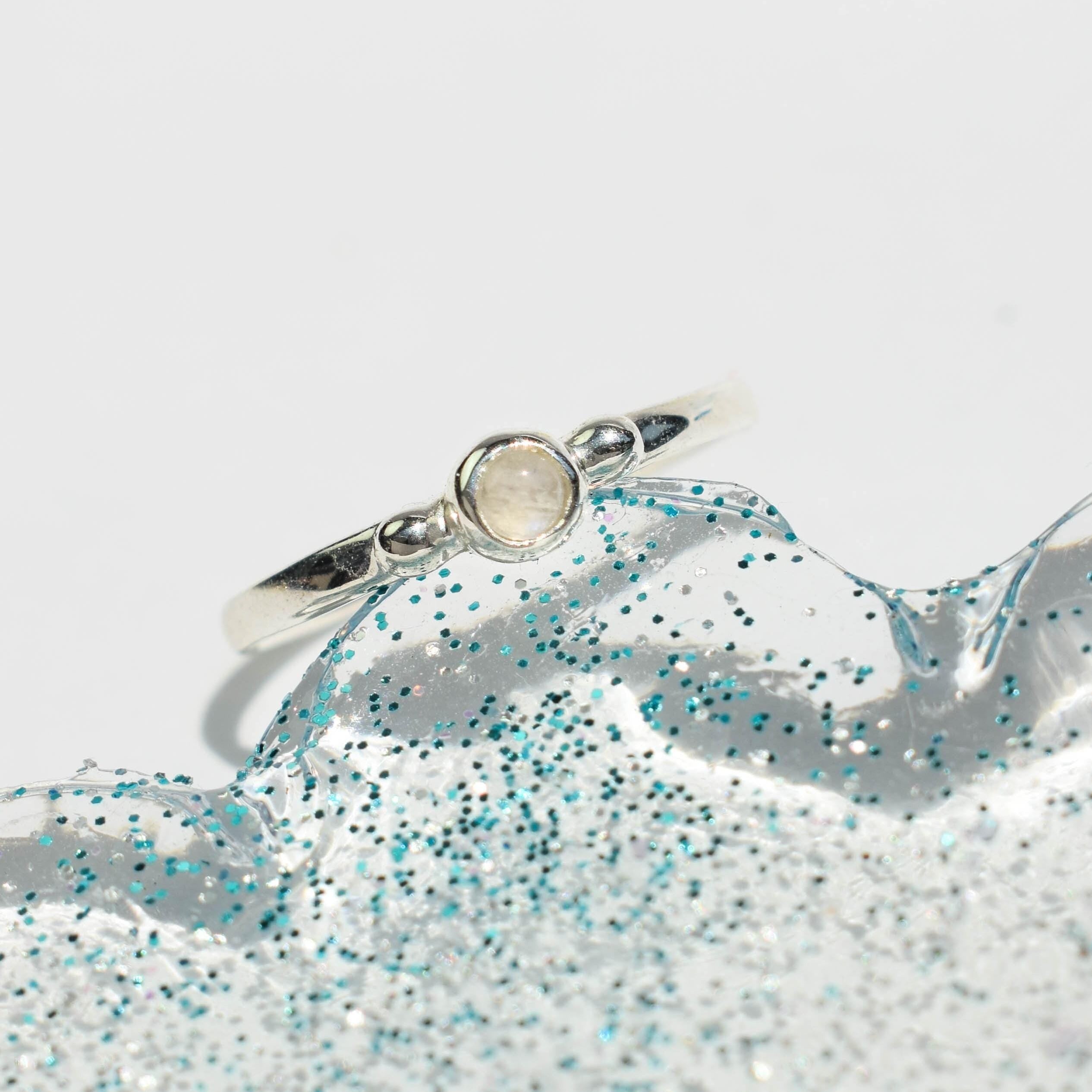 Tiny moonstone ring