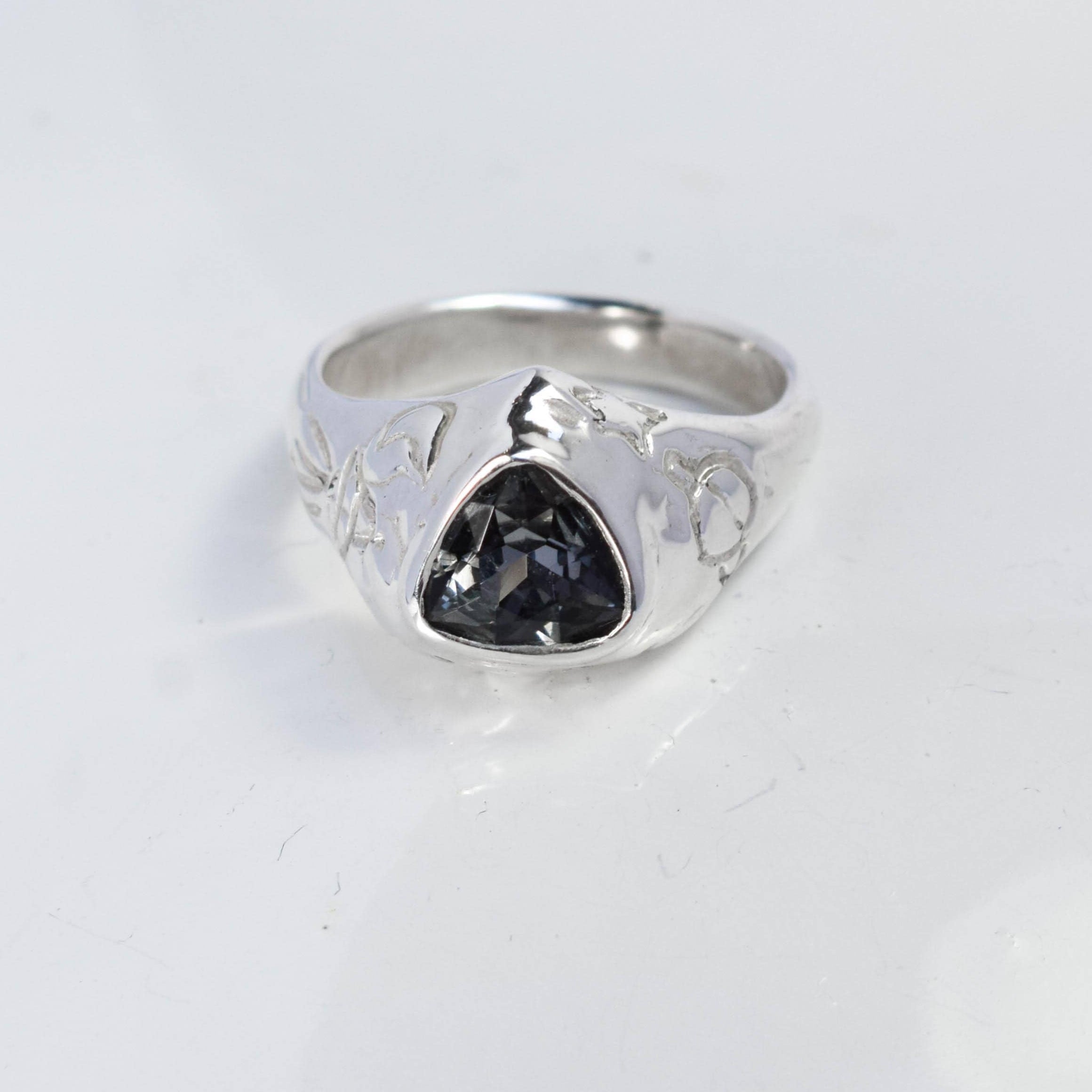 Celestial signet ring with stars and moons
