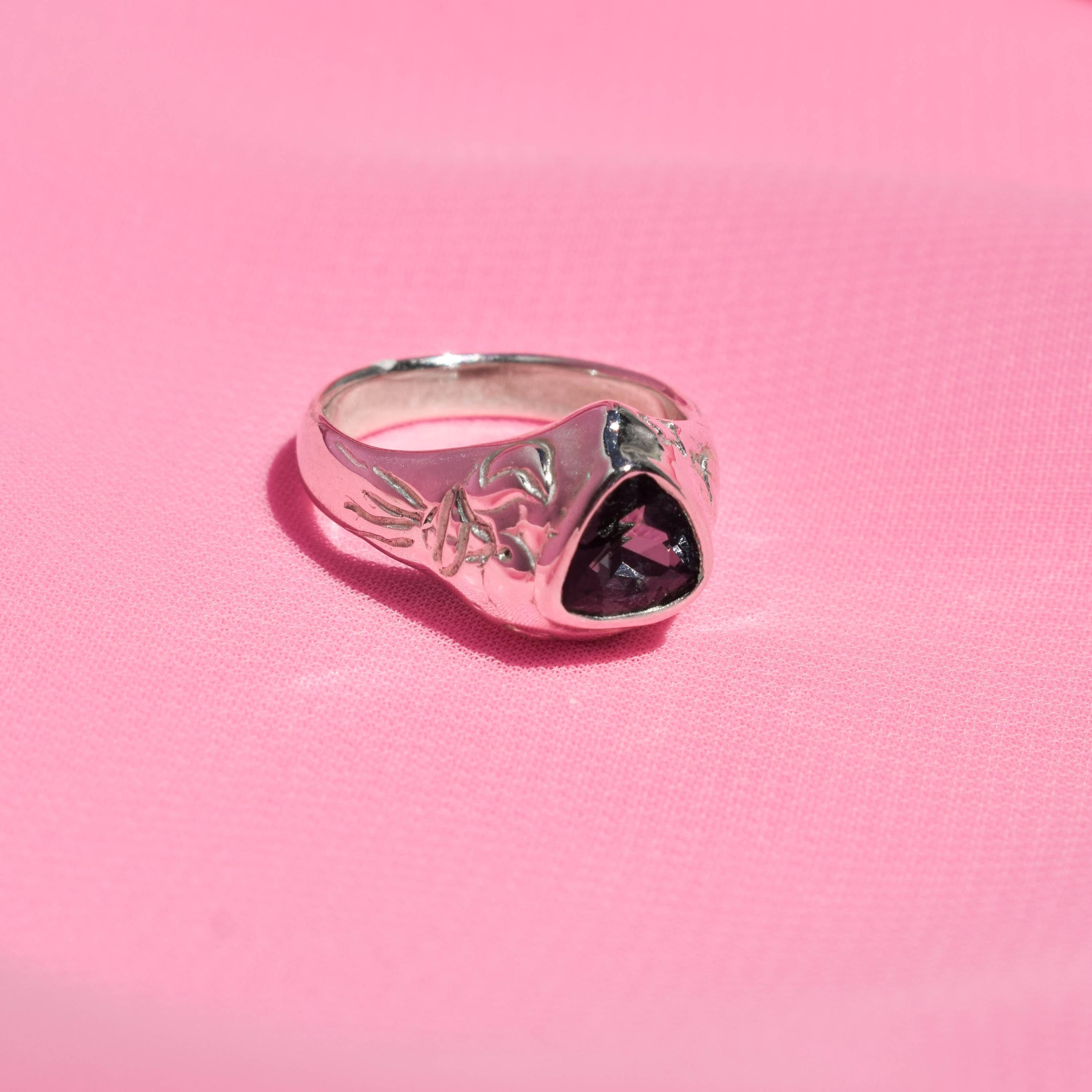 Celestial signet ring with stars and moons