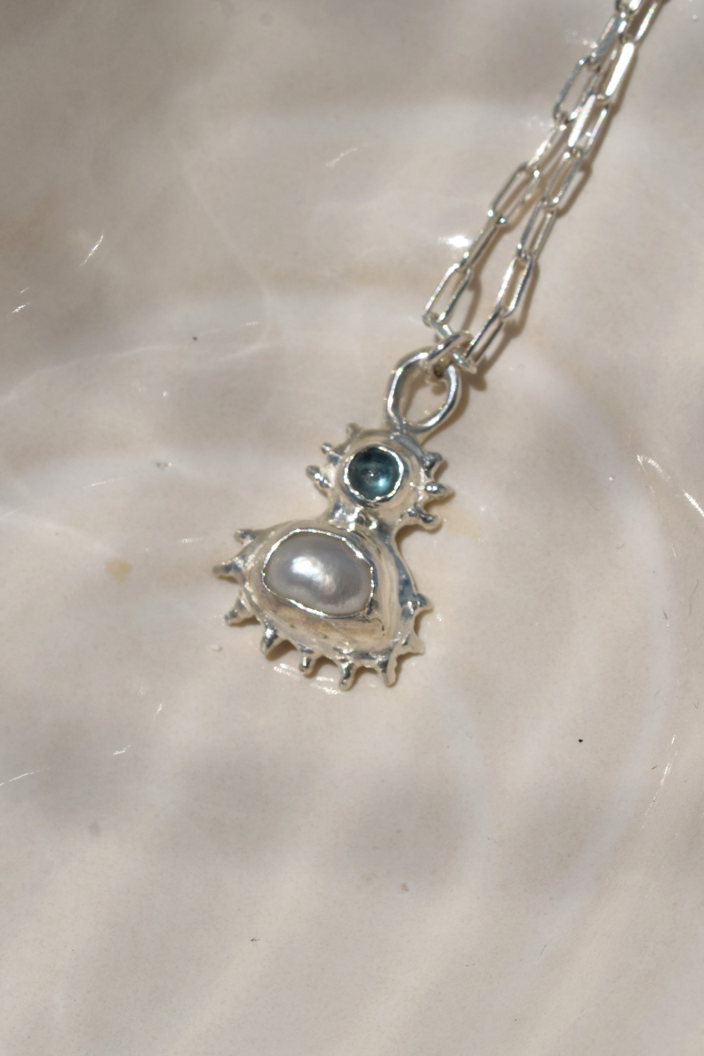 Coral inspired sterling silver pendant with blue topaz & freshwater pearl