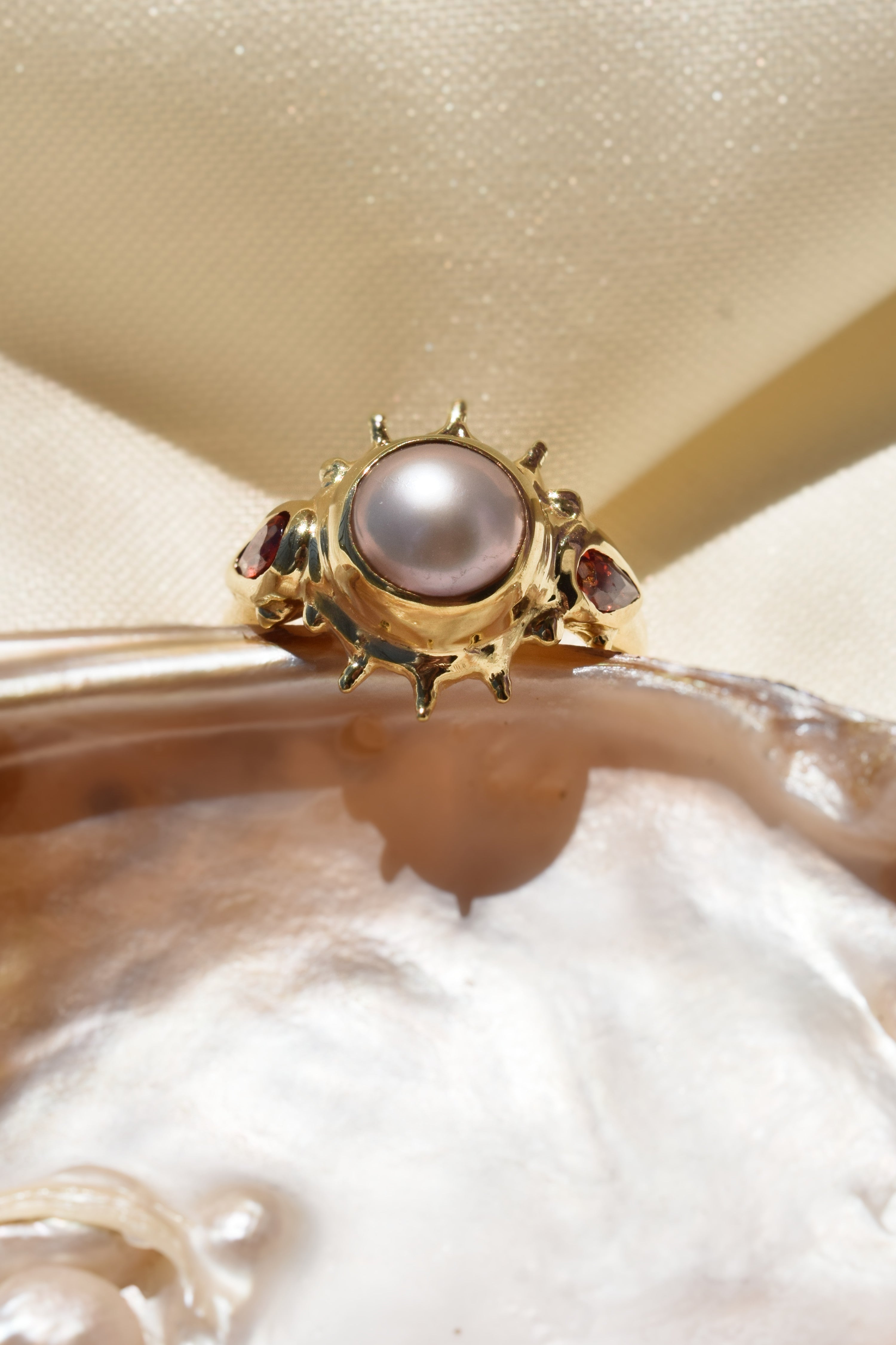 Pearl sun ring with garnet accents – Statement cocktail ring