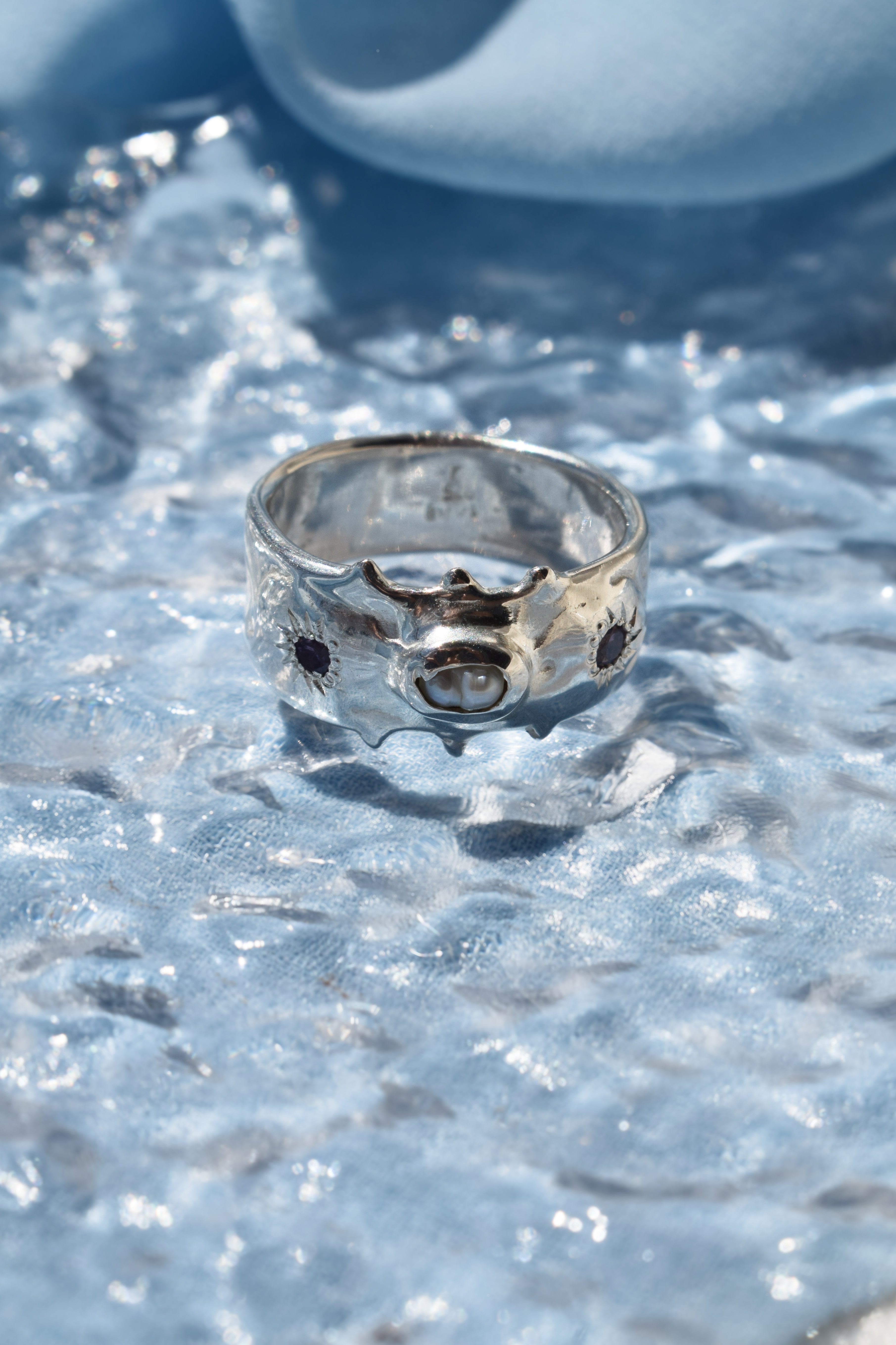 Silver pearl & purple cz crystals wide band ring
