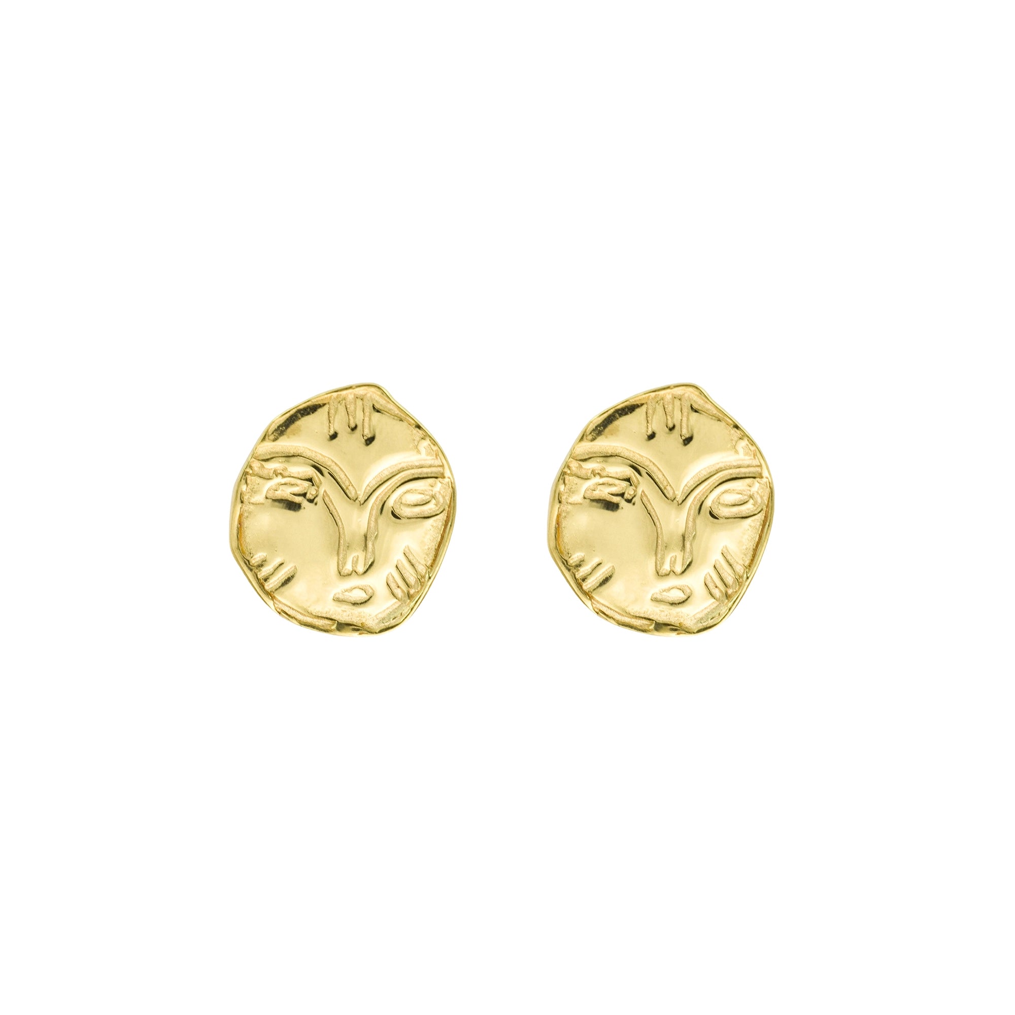A pair of gold-toned stud earrings shaped like stylized ram or goat heads, shown on a plain white background.