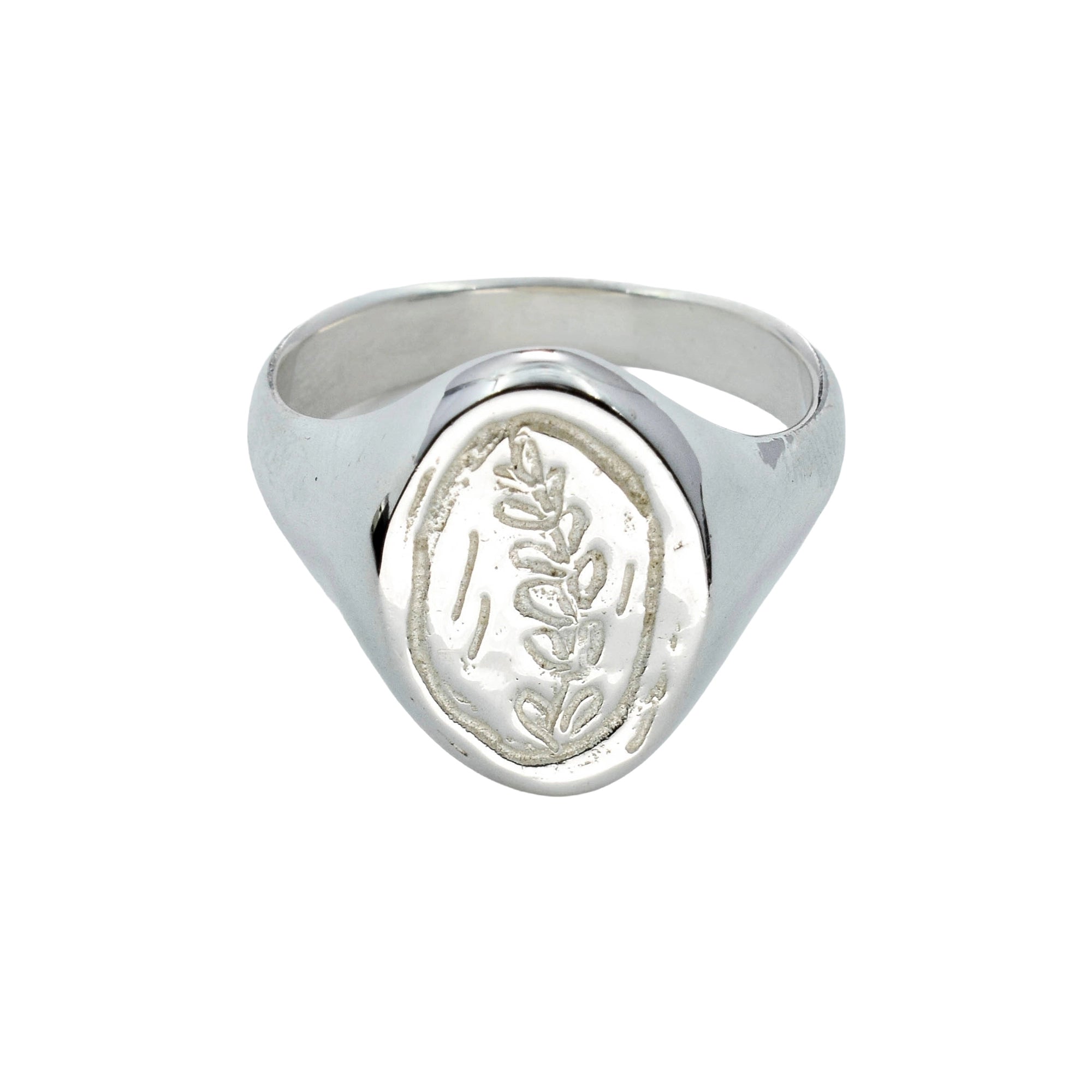 A silver signet ring with an oval face featuring an embossed wheat stalk design, shown on a plain white background.