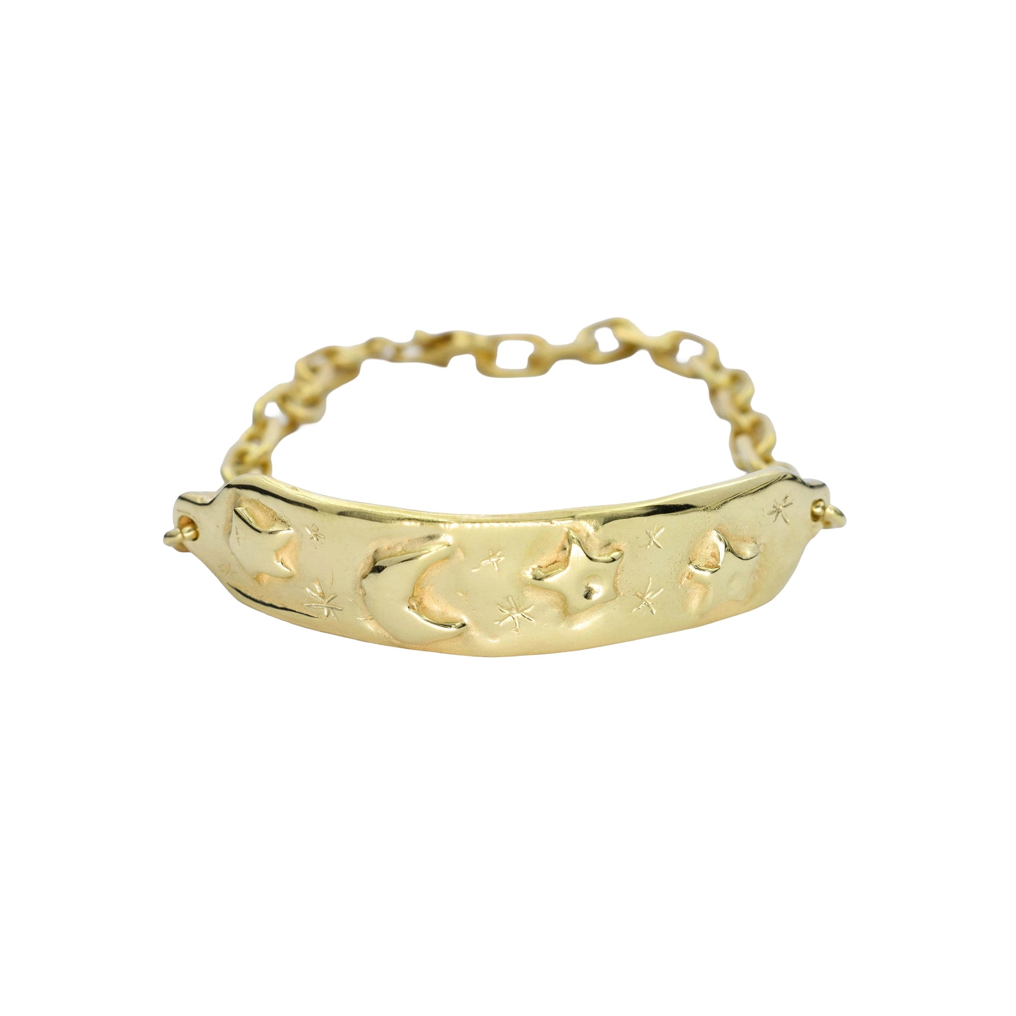 Gold bracelet with star and moon designs on a white background