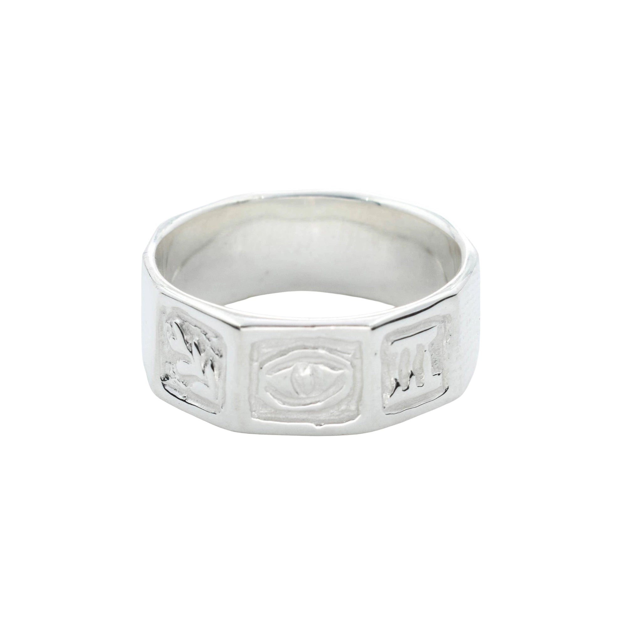 A silver-toned octagonal ring featuring three raised square panels with stylized symbols, shown on a plain white background.