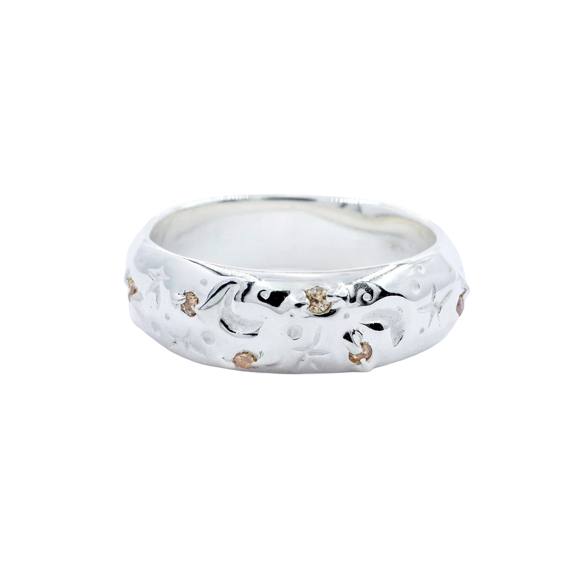 Wide band rings with clear crystals