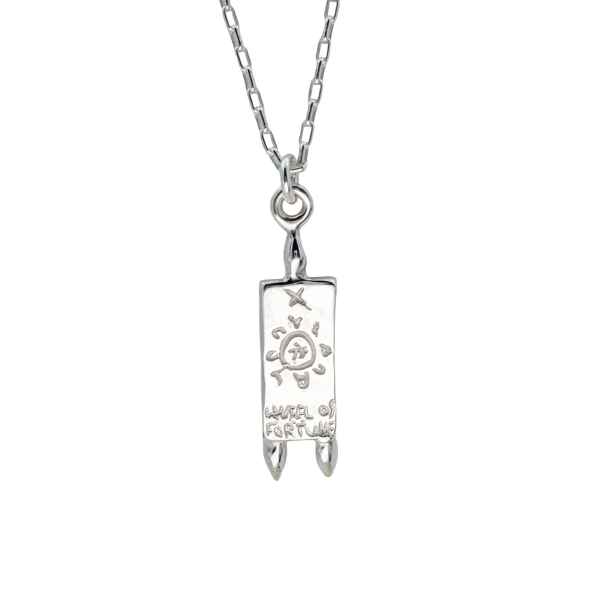 A silver pendant necklace featuring a rectangular charm engraved with a sun, moon, and the words 'Wheel of Fortune', suspended from a silver link chain against a plain white background.