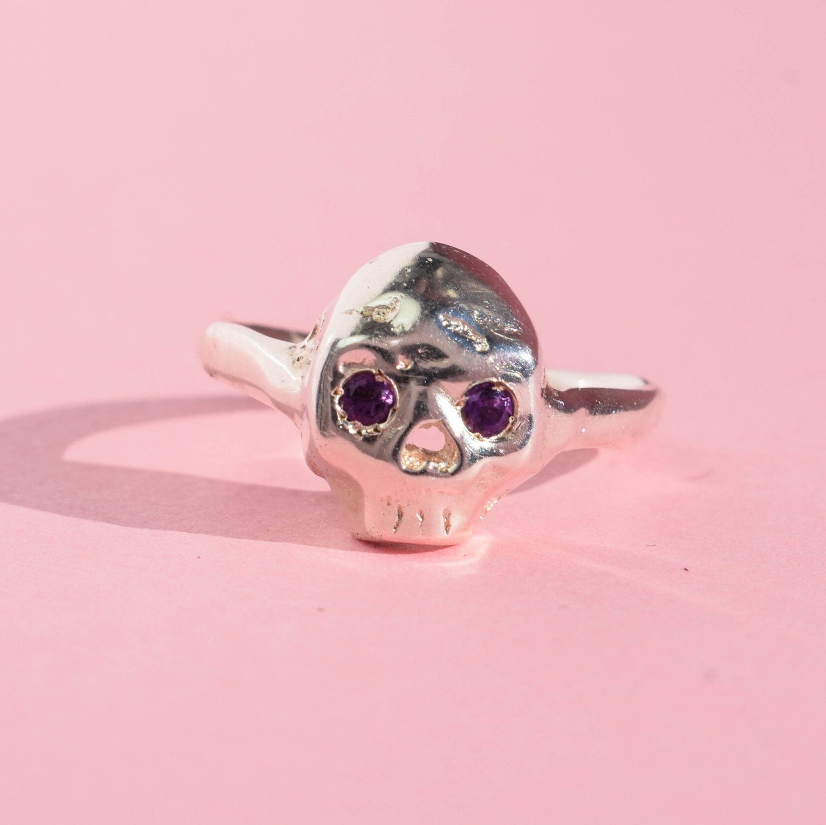Sterling silver skull ring with amethysts