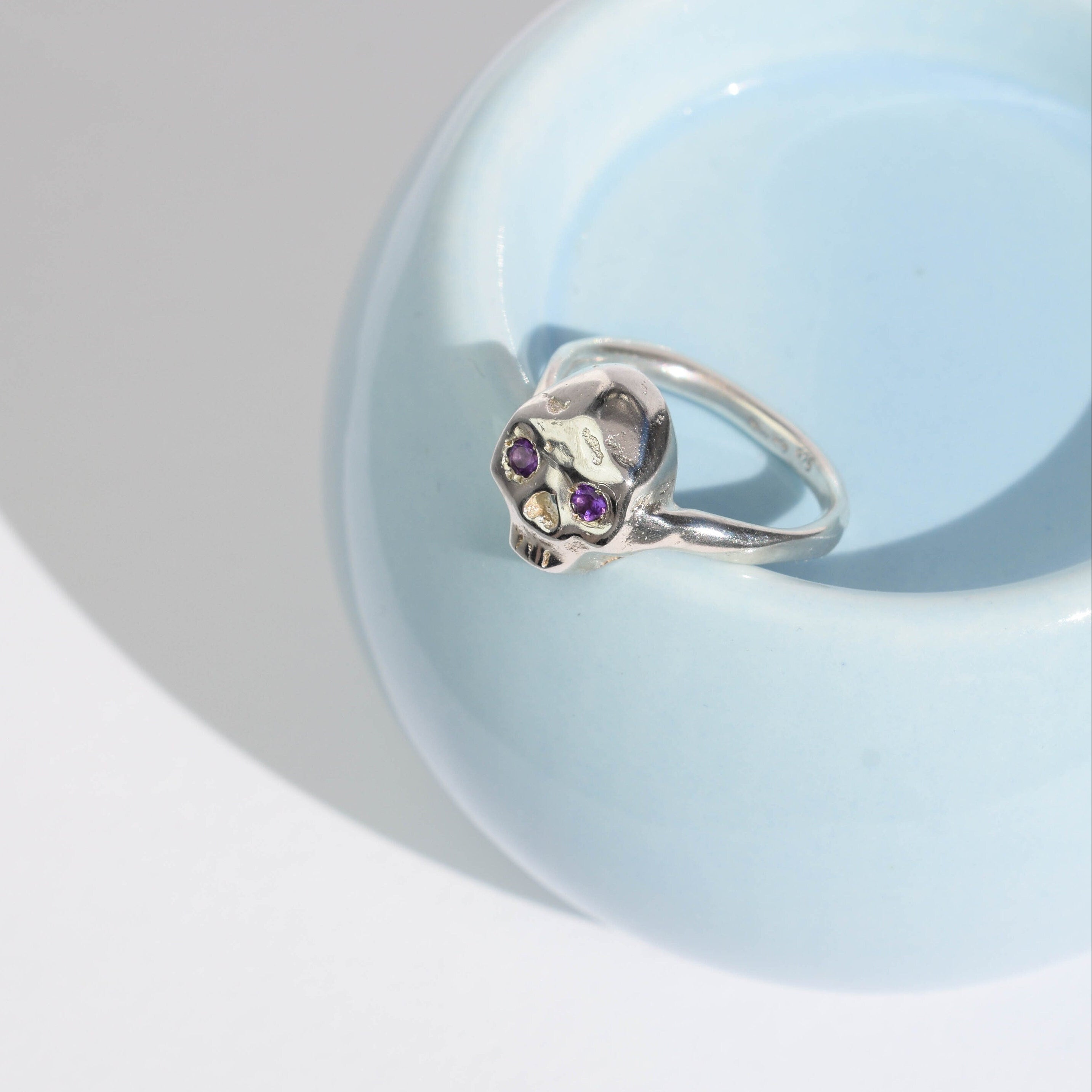 Sterling silver skull ring with amethysts
